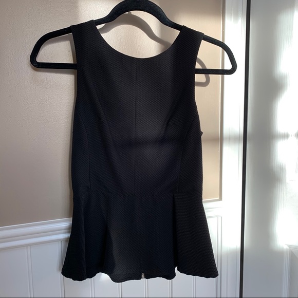 Black peplum top, with back cutouts - Picture 1 of 6